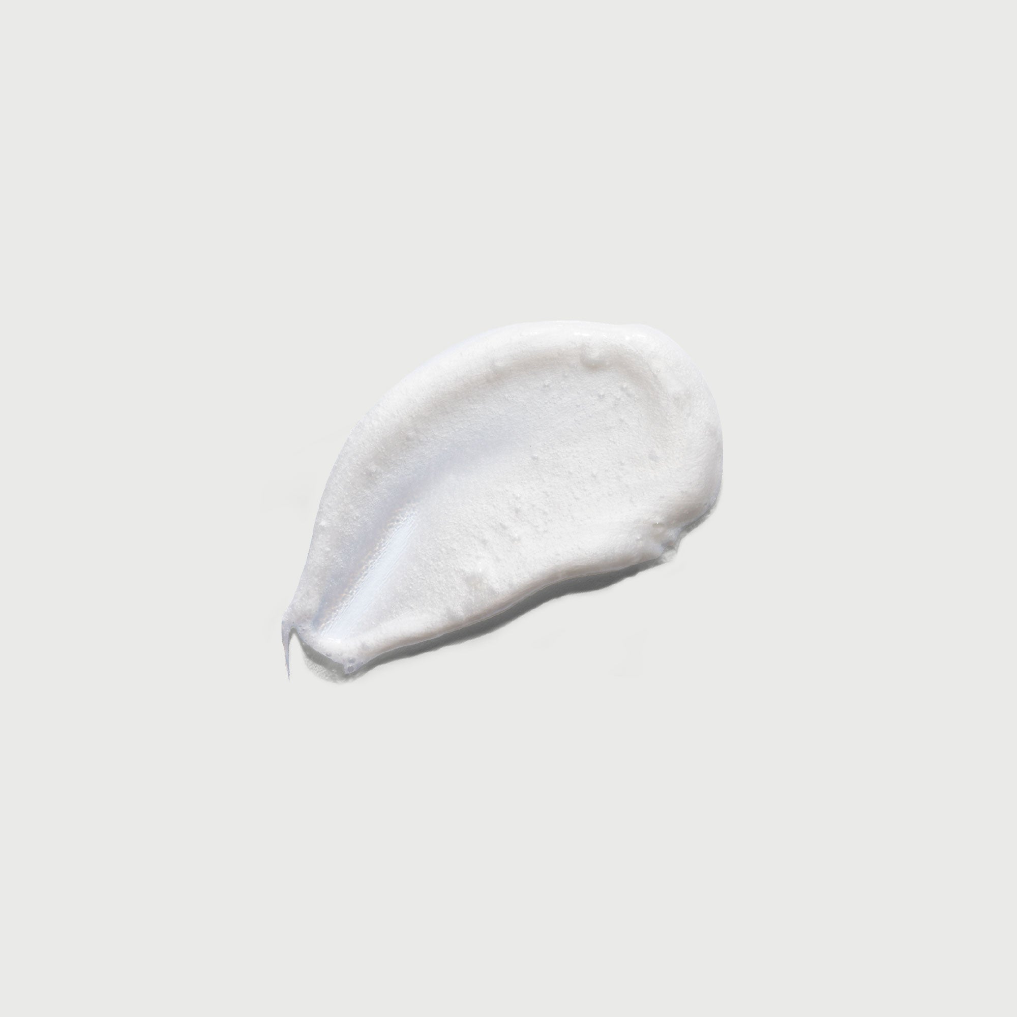 the-smoother-glycolic-acid-exfoliating-body-wash-a7 NATR-40002-Swatch-The-Smoother-Glycolic-Acid-Exfoliating-Body-Wash-bonebkgd.jpg