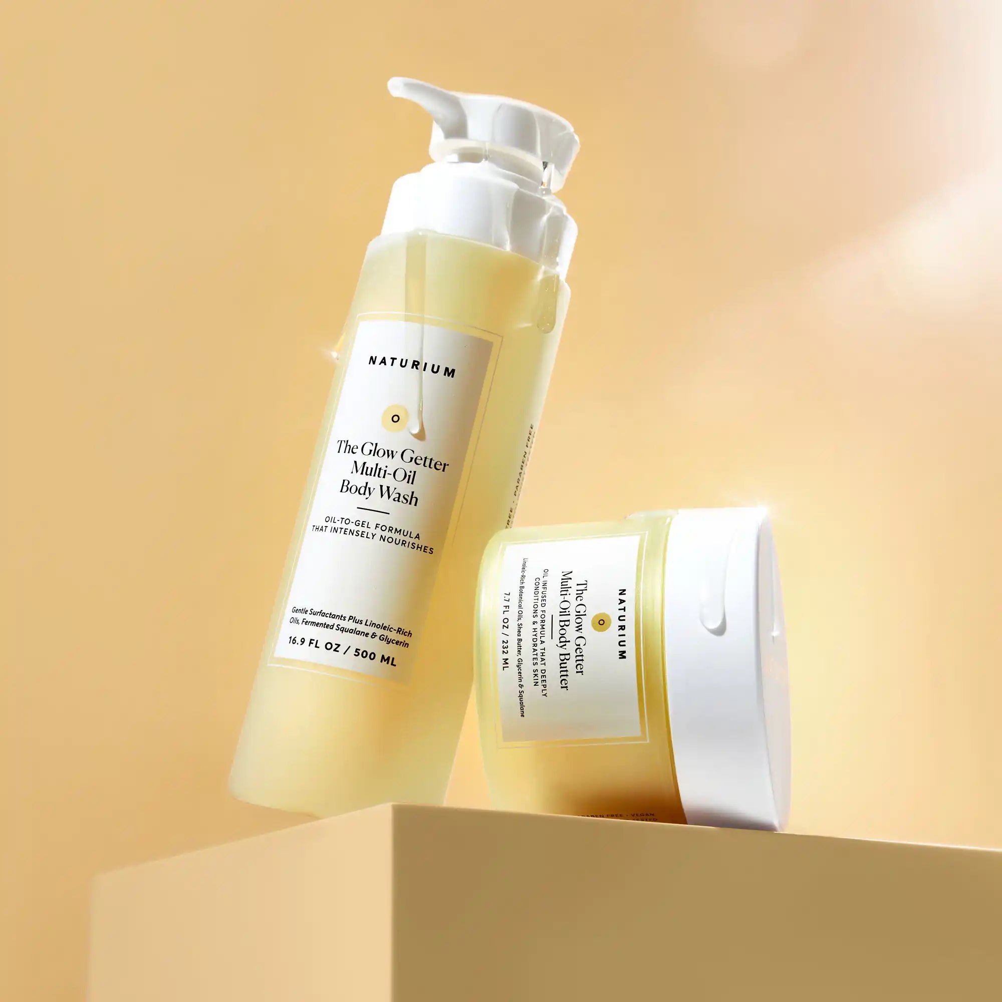 the-glow-all-out-body-bundle-c7 gg-bodybutter_1464-crop_revcolor_FL.webp